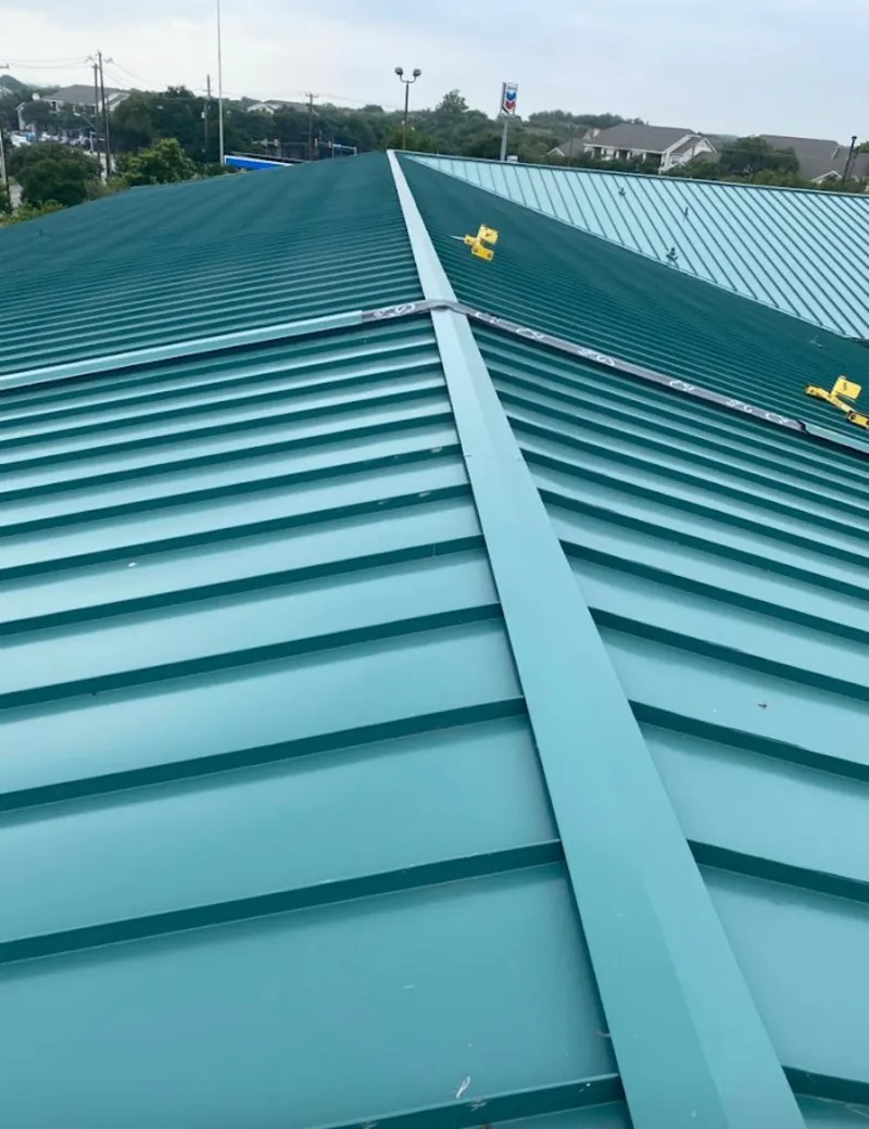 Green commercial metal roof ridge and valley for Metal Roof Repair in Lower Oxford